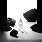 آمپول روشن‌کننده و ضدلک اسکین 1004 مدل Tone Brightening حجم 100 میل